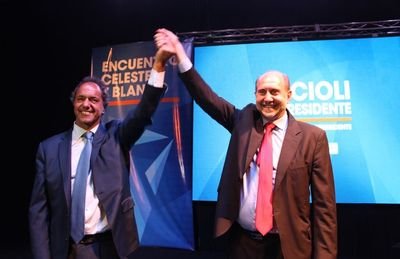 Perotti y Scioli, con empresarios rosarinos